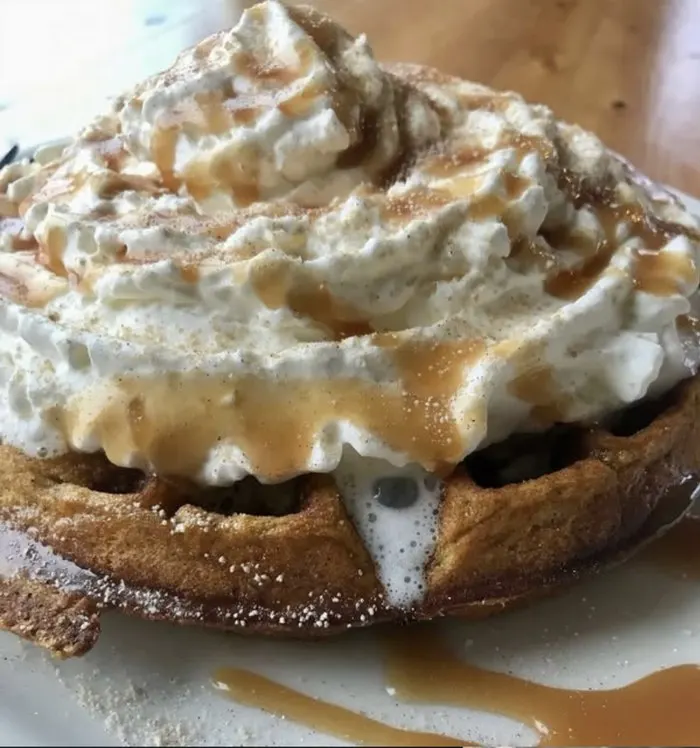 A Belgian waffle topped with whipped cream and caramel at The Fisherman's Daughter in Hoonah, Alaska