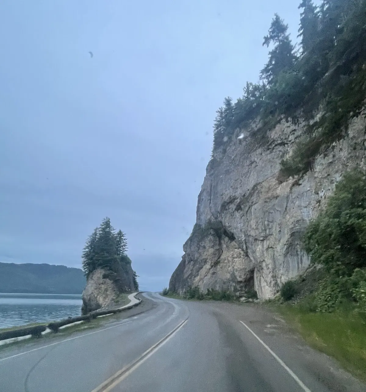 Shaman Point, a dramatic rock outcrop along the shoreline road between Icy Strait Point and Hoonah