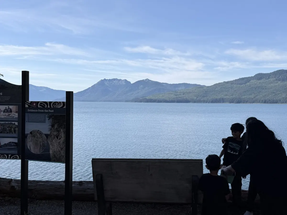 Open water and mountains along the shoreline path between Icy Strait Point and Hoonah